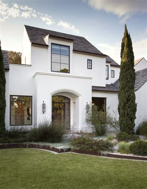 white stucco house with black metal roof|metal roof stucco interior design.